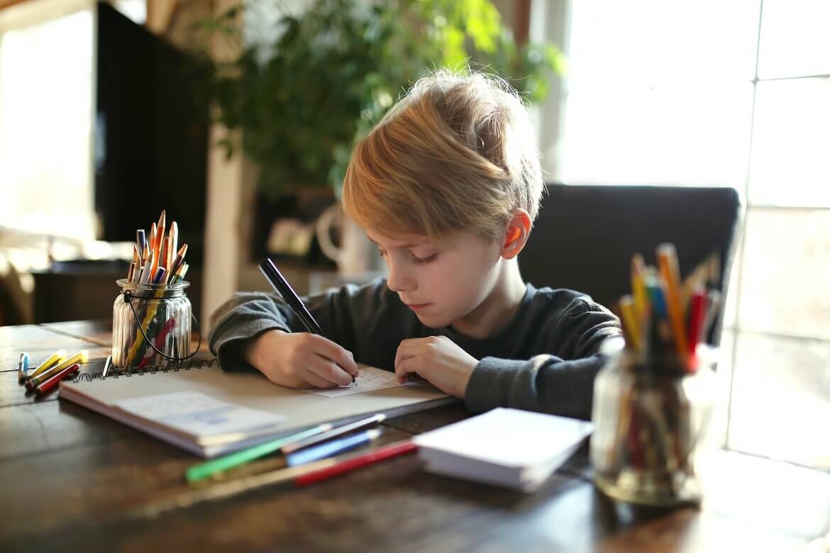 child writing a story